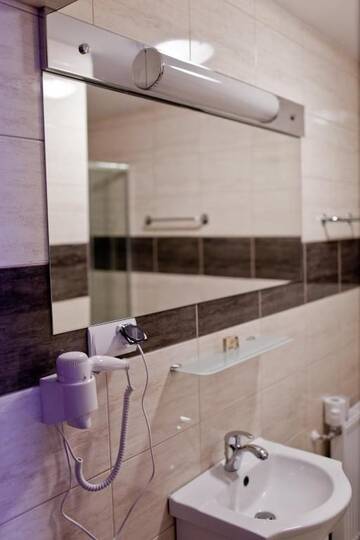 Фото номера Двухместный номер с 2 отдельными кроватями Апартаменты Apartamenty Pod Lwem г. Свидница 12