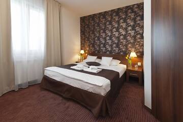 Фото номера Двухместный номер Делюкс с 1 кроватью Отель Hotel Esperanto г. Свидница 4